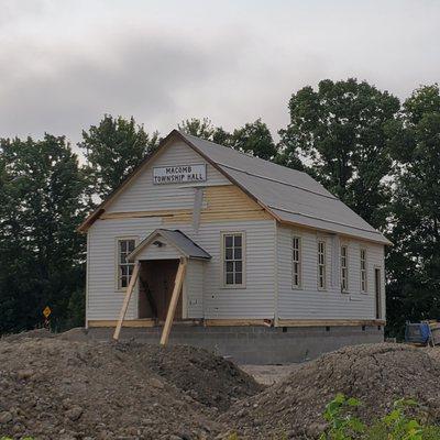 On June 21 this Historic 104 Yr Old Macomb Township Hall was moved from Romeo Plank Rd to across the Municipal Bldg on 25 Mile Rd. 8/21/2023