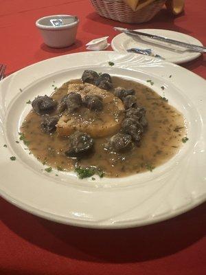 Escargot in a butter sauce