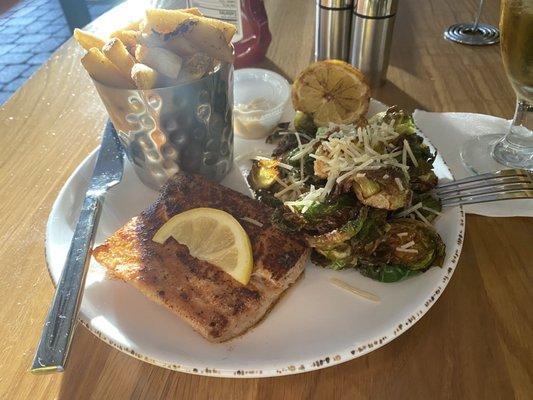 Blackened mahi mahi Brussels sprouts and fries