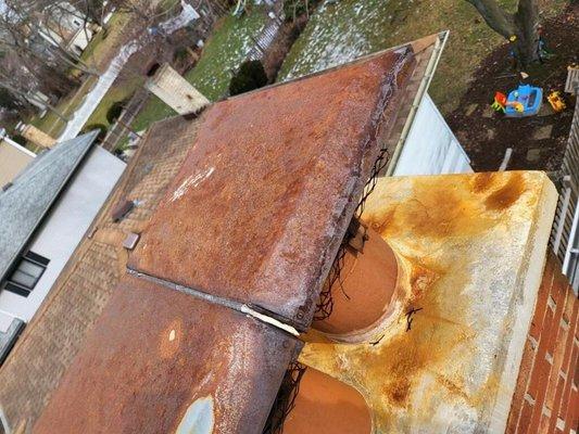 Rusted out flue cap