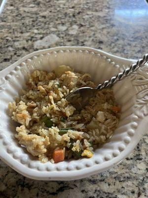 Pineapple fried rice with chicken-lunch portion. This was a takeout meal so I only used small bowls at my house and still had some leftover.