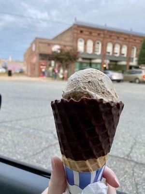 Almond Joy frozen Custard in a dipped cone.