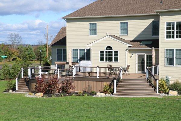 Wolf Amberwood deck with Black Walnut border, Timbertech Radience railing - Newtown PA