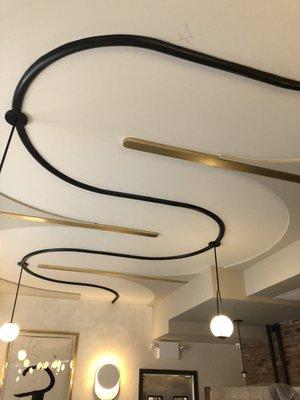 Decoration paint ceiling and molding black it's one  new restaurant in Manhattan