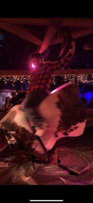 My boyfriend on the bull!!