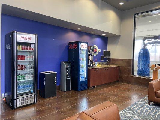 Spacious and roomy waiting area with complementary drinks and popcorn