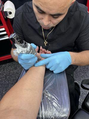 Getting my $10 tattoo