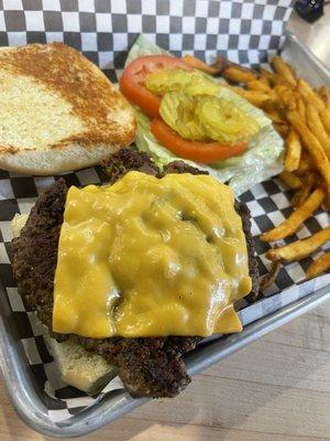 Classic burger with Cajun fries.