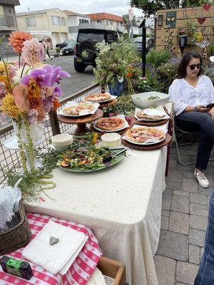 Pizzas and Caesar salad