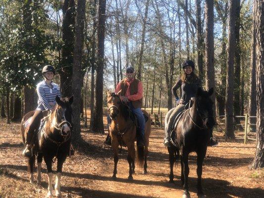 Adrienne, Jimmy and Gina starting out on trail ride.