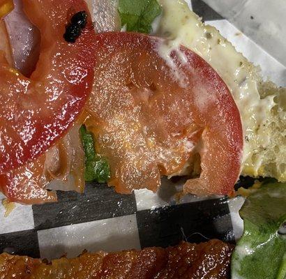 On the other picture u can see the dead fly on the tomato and the hair on the bottom right on the bacon