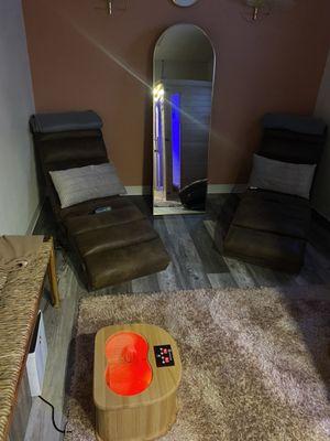 Massage chair and Himalayan salt for the feet in the sauna room