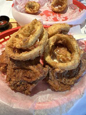 Fried chicken and fried onion rings.