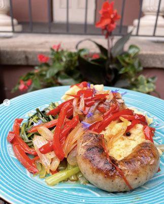 Misty Mountain Farm sausage, grilled and served with braised Italian greens, sweet peppers and polenta.