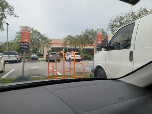 I hate that the reserved pickup slots are either blocked by jerks who leave the carts in place or drivers who went inside and parked there.