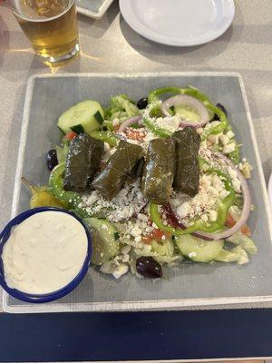 Greek salad with dolmades and tzatziki sauce