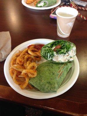 Chicken salad spinach wrap and curly fries