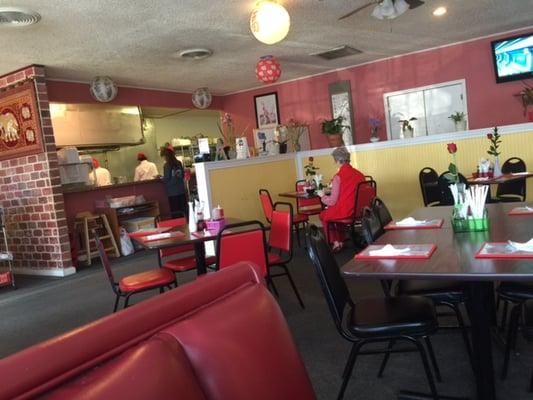 Chef preparing our lunch. Clean floors and booths.