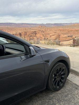 Model Y overlooking Horseshoe Bend in contemplation of the bright future for Tesla