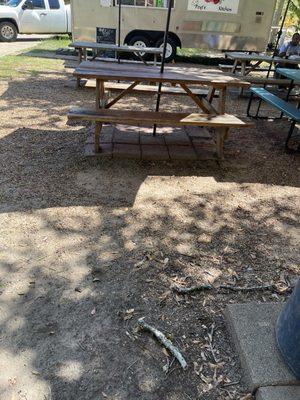 Don't want to wait? You can eat at a shared picnic table.