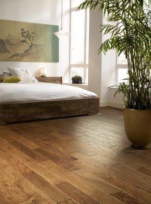 Hardwood floors are timeless. Pictured here is Shaw Brushed Suede in Sugar Cane.