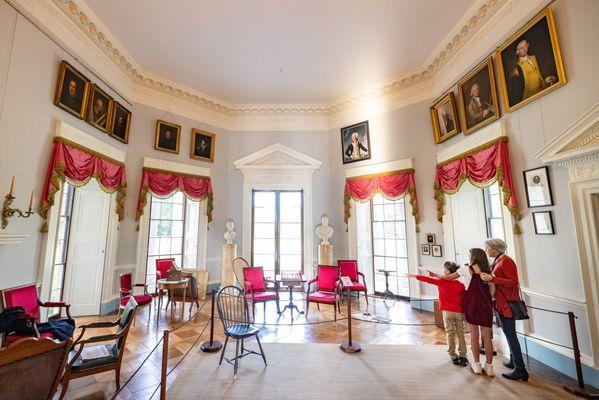 Family and friends gathered in Monticello's Parlor for games, music, and conversation.