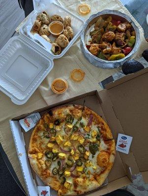 Royal paneer pizza with spicy sauce, vegetarian fried Momos and chilli chicken Momos! Delicious!