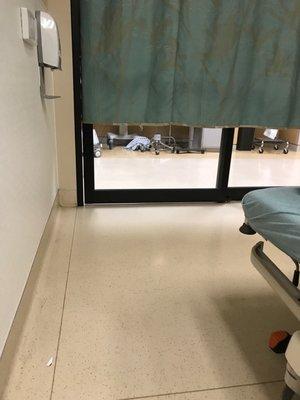 Dirty gown on the floor where the nurses station is