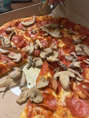 Ordered a large pepperoni and mushroom pizza...had mushrooms dumped on at the end that were cold