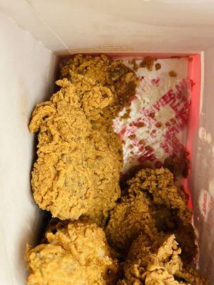 Chicken in the box. The grease dripped off the chicken out of the box.