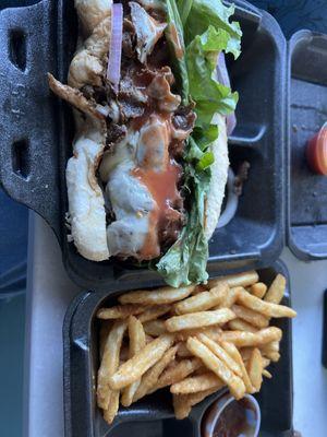 Philly cheesesteak and fries.