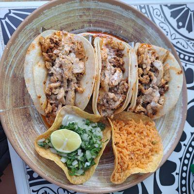 Tacos Azteca with side of rice and side of cilantro/ onion mix