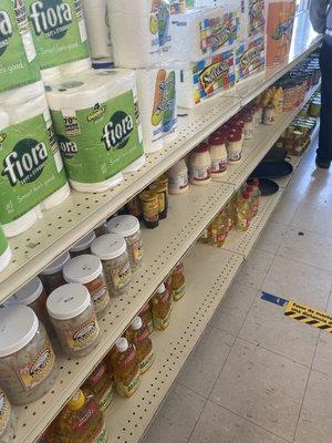 Grocery aisle.  Get your toilet paper here!  Also a line winding through the aisles.  Busy on Saturday!