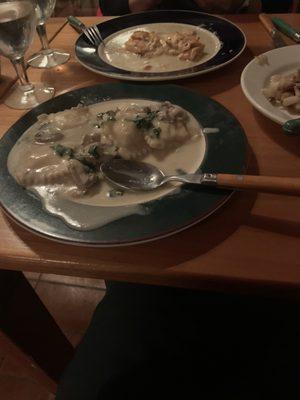 Oyster Rockefeller pasta, and a salmon dish with potatoes.