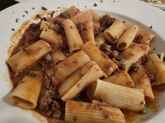 Ground strip steak, veal, and pork  Bolognese fra diavlo style on rigatoni. Just WOW.