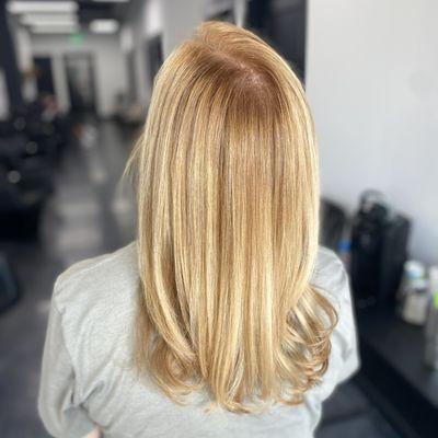 Strawberry blonde base color and golden balayage