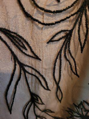 Crimped and Crinkled beige silk material