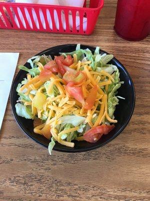 Salad with the hamburger steak for lunch.