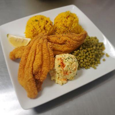 Yellow Rice, Sweet Peas, Potato Salad and Fried Fish.