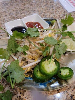 This is what their passing off for the veggie side for a bowl of a their missing the other herbs.  And they charge for extra geens