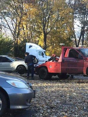 The driver will jimmy your car open to remove the resident tag so he can tow it.