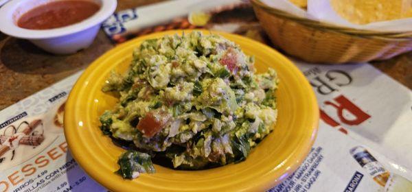 Fresh guacamole made right at our table