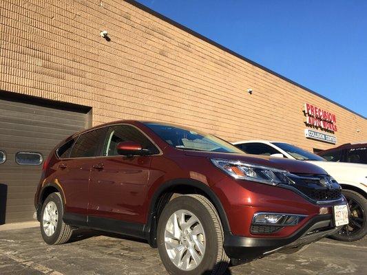 A completed 2015 Honda CRV after coming to us for extensive nose and side damage. Another ecstatic customer!