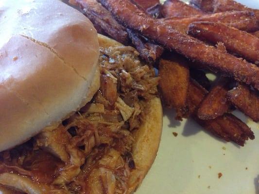 Pulled pork sandwich with perfectly crisp sweet potato fries