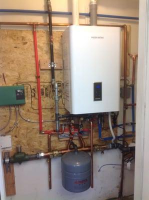 Navien wall hung boiler / water heater combination call today for your free in home estimate