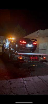 Camaro being towed