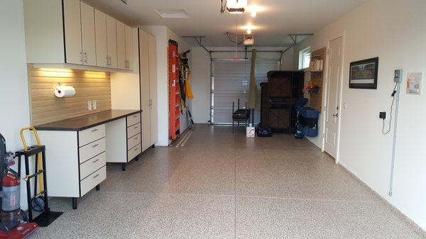 Premium almond garage cabinets, 1/4" garage floor coating in almond.  FlowWall storage systems