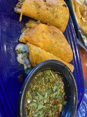 Birria tacos and consommé