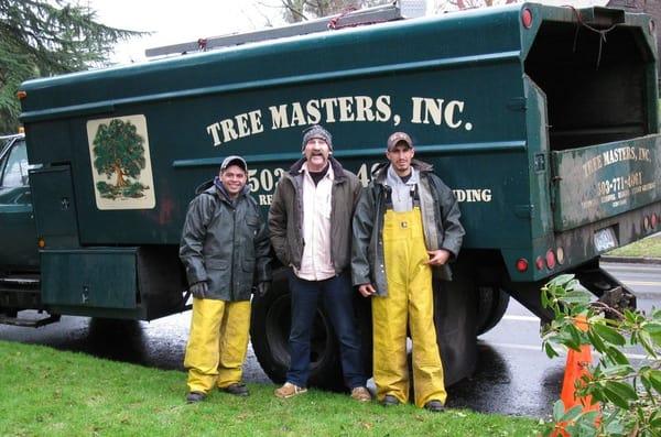 The owner Tom Burke and 2 of his trained crew.