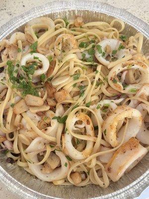 Grilled calamari over linguine